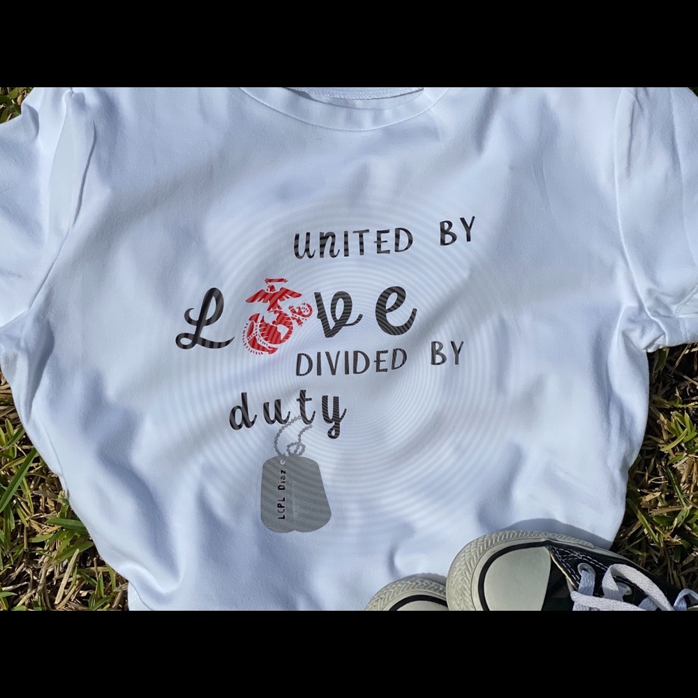 United by love, divided by duty graphic tee